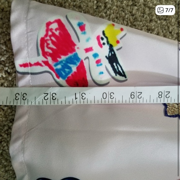 Whimsical Pink Midi Dress with Playful Prints - Picture 16 of 16